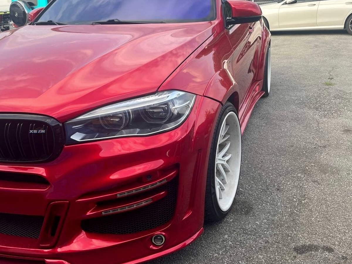 Red BMW X6M protected with PPF